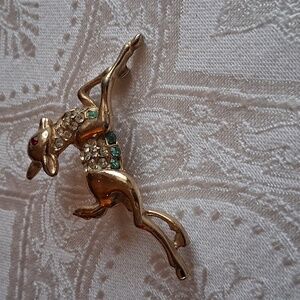 Vintage  goldtone with rhinestones reindeer Christmas  broach